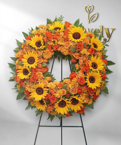 Vibrant Sunflower and Orange Rose Funeral Wreath