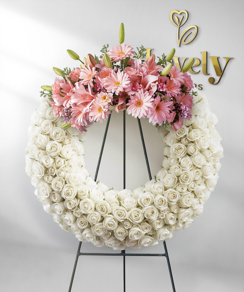 Elegant White Rose Funeral Wreath with Pink Gerberas & Lily Accents
