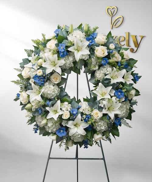 Elegant White & Blue Funeral Wreath with Lilies, Roses & Hydrangeas