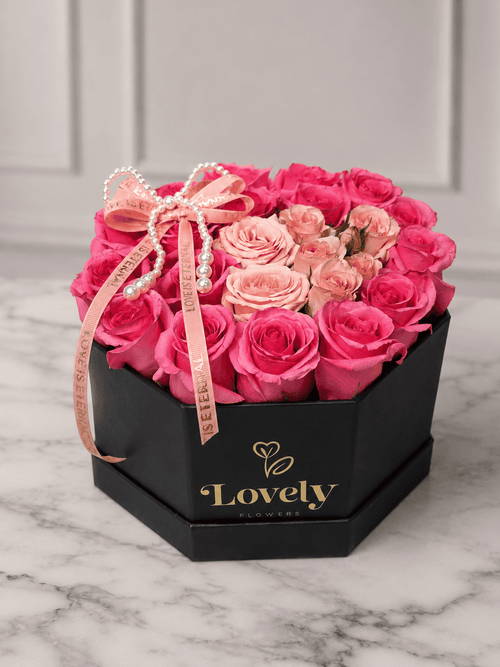Black Hexagonal Box with 25 Pink Roses and Pearl Bow