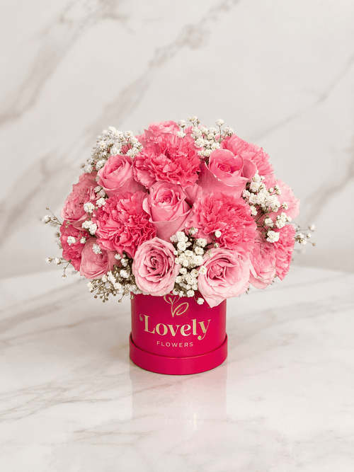 Small Fuchsia Round Box with 20 Roses, Carnations and Baby Breath