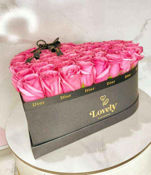 Medium Black Heart Box with 65 Pink Roses