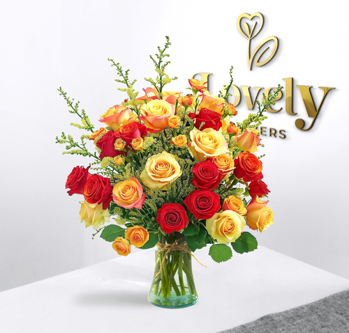 Premium Red and Yellow Rose Bouquet in Glass Vase